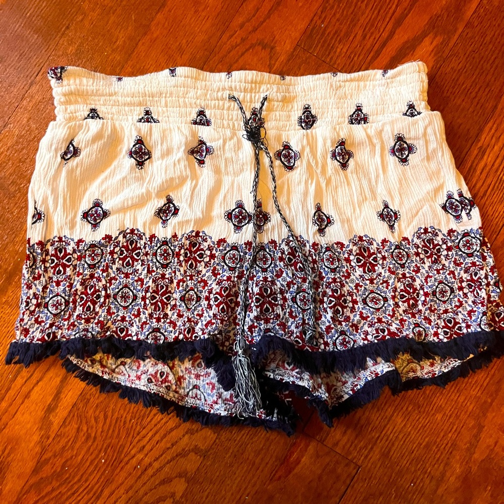 These are flowy shorts that are red blue and white